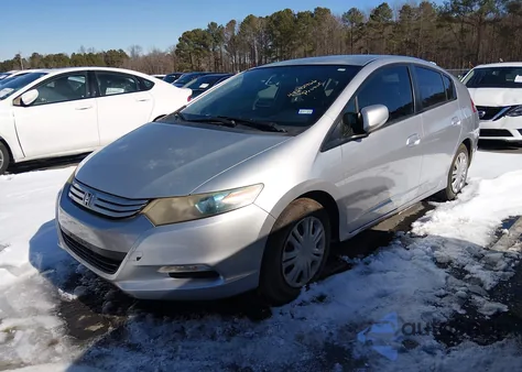 2010 Honda Insight Lx z USA, uszkodzony, nr VIN JHMZE2H51AS042038